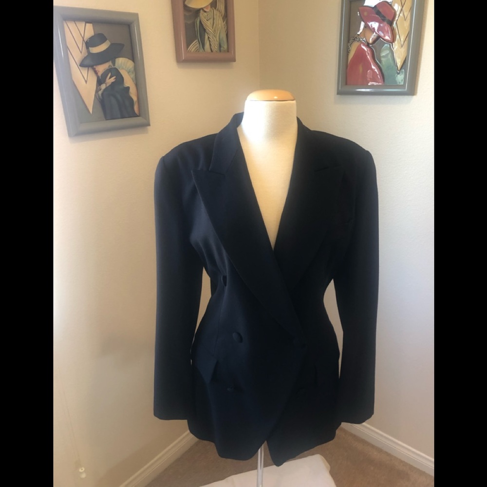 Black wool fitted jacket.arm pit to sleeve 17”.  Length collar to hem 30 1/2”